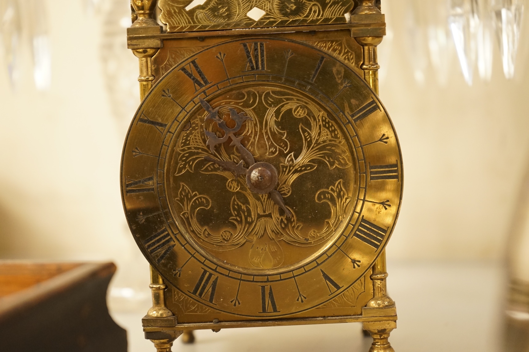 A small brass lantern clock, 26cm high